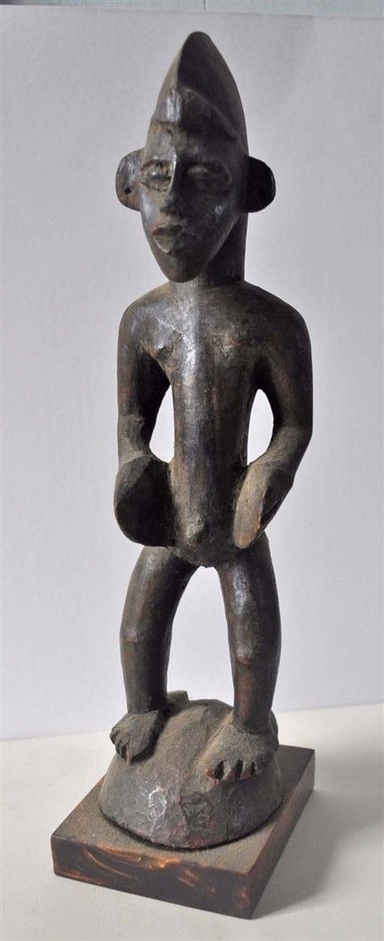 Null Lot de 2 statuettes en bois sculpté: homme debout. SENOUFO. Ht. 31cm + femm&hellip;