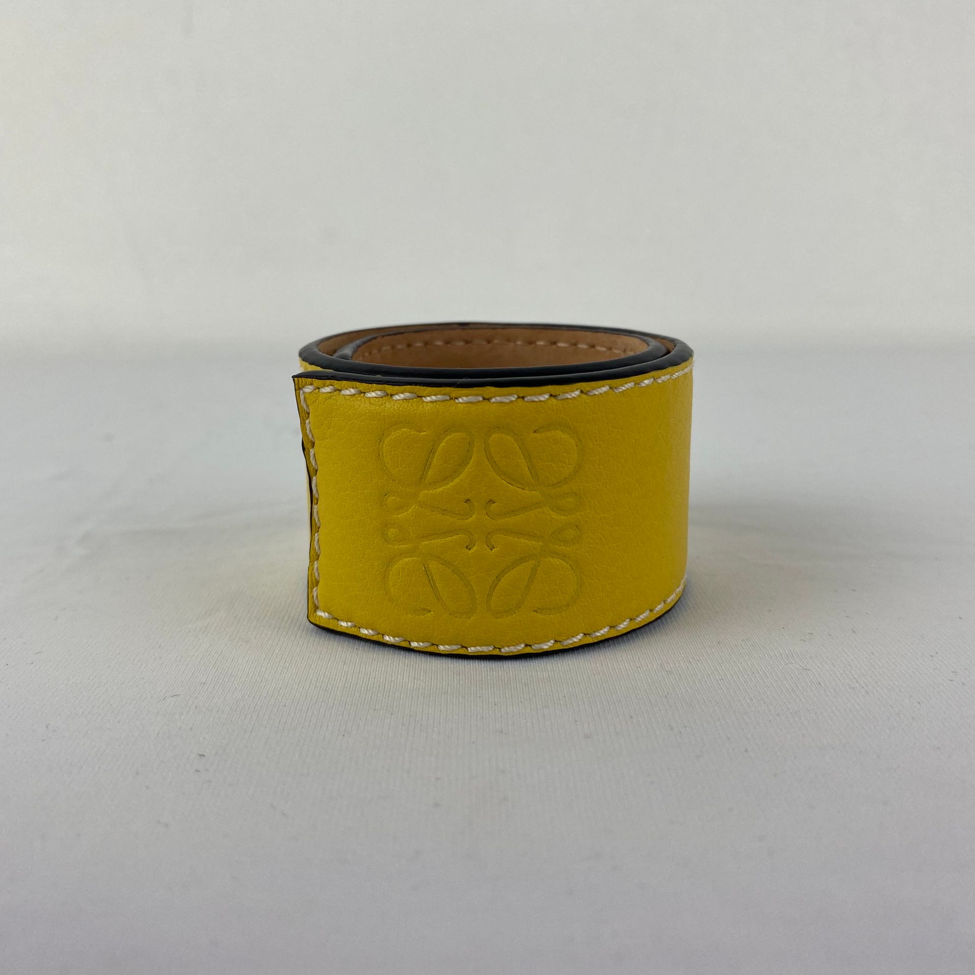 LOEWE A yellow leather LOEWE bracelet. Brand new in the box