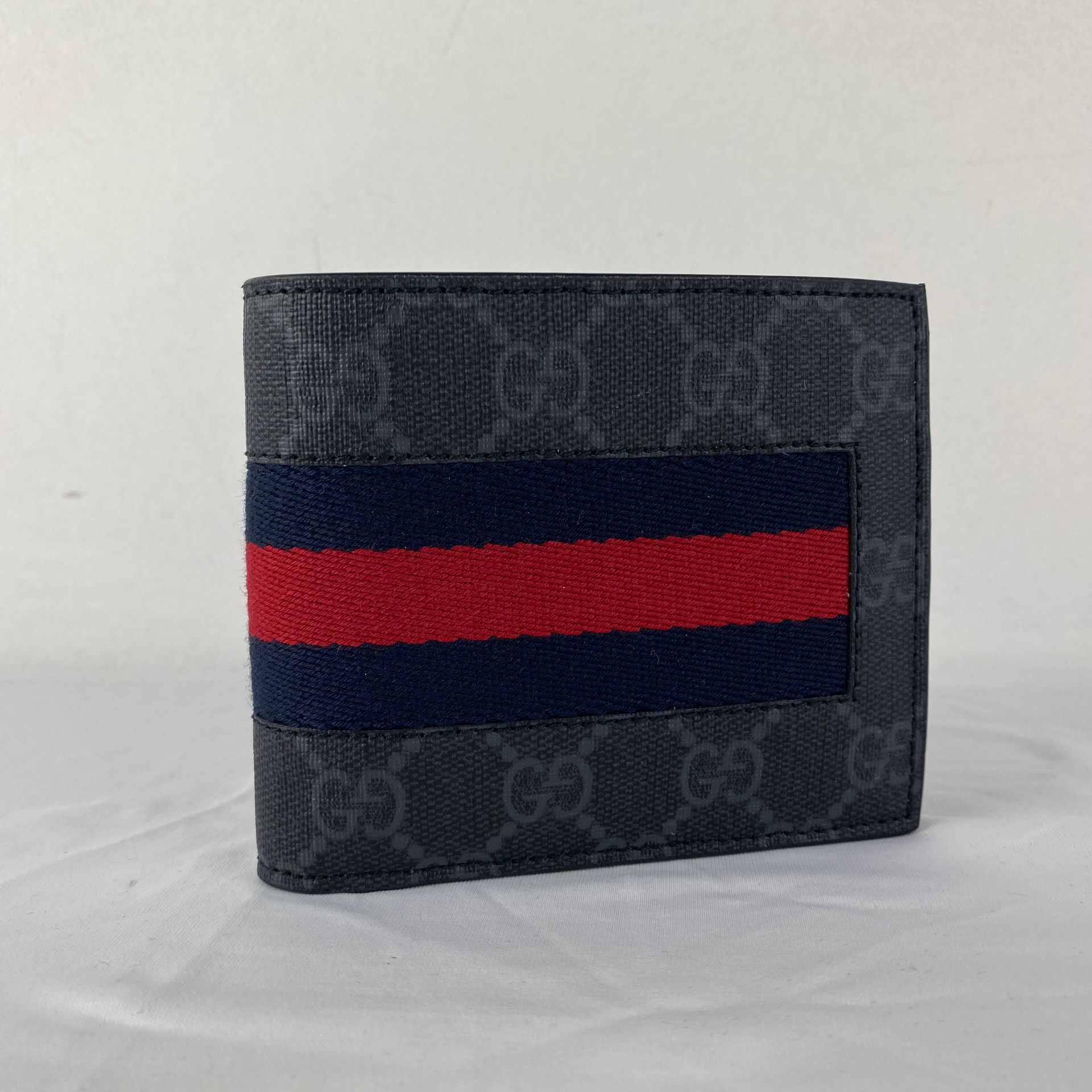 GUCCI A GUCCI wallet in GG supreme canvas with web stripe, black color, new with&hellip;