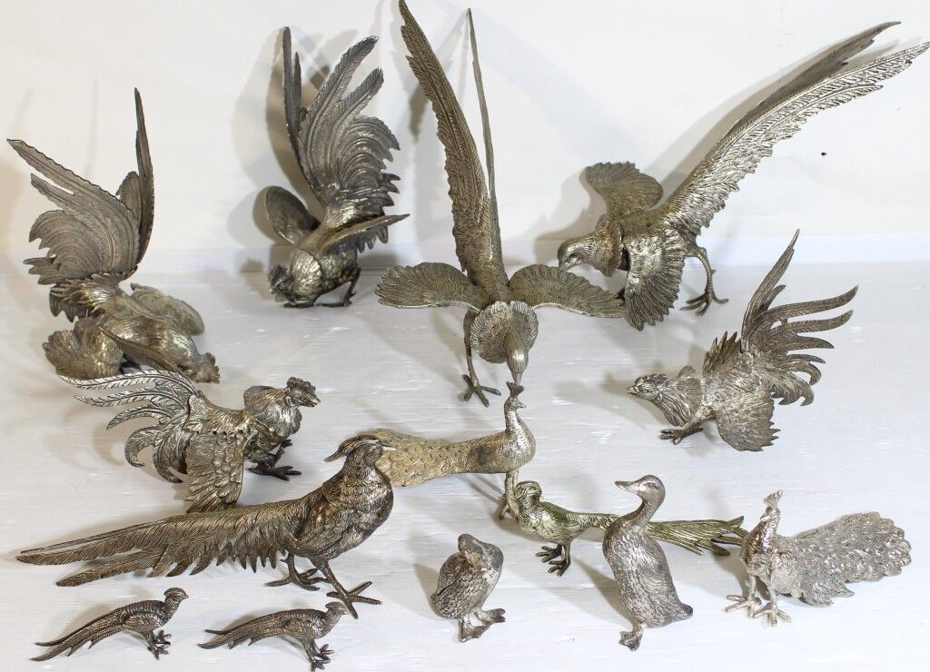 Null Posten von 14 Vögeln aus versilberter Bronze.