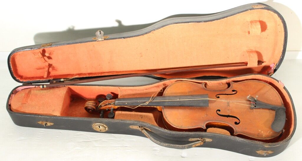 Null Set of 3 violins and two bows in their cases.