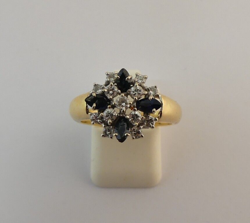 Null Yellow gold ring set with 4 navette sapphires and 13 modern-cut diamonds on&hellip;
