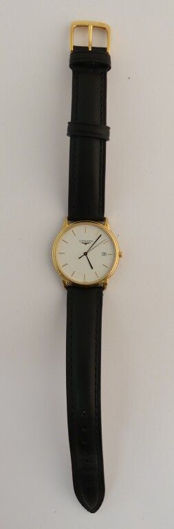 Null Longines. Watch in gilded metal with leather strap. Quartz movement. Diam. &hellip;