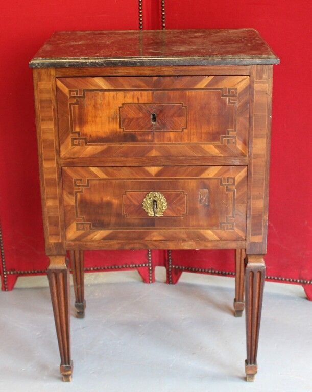 Null Marquetry chest of drawers. It opens with two drawers. Sheath feet. Marble &hellip;