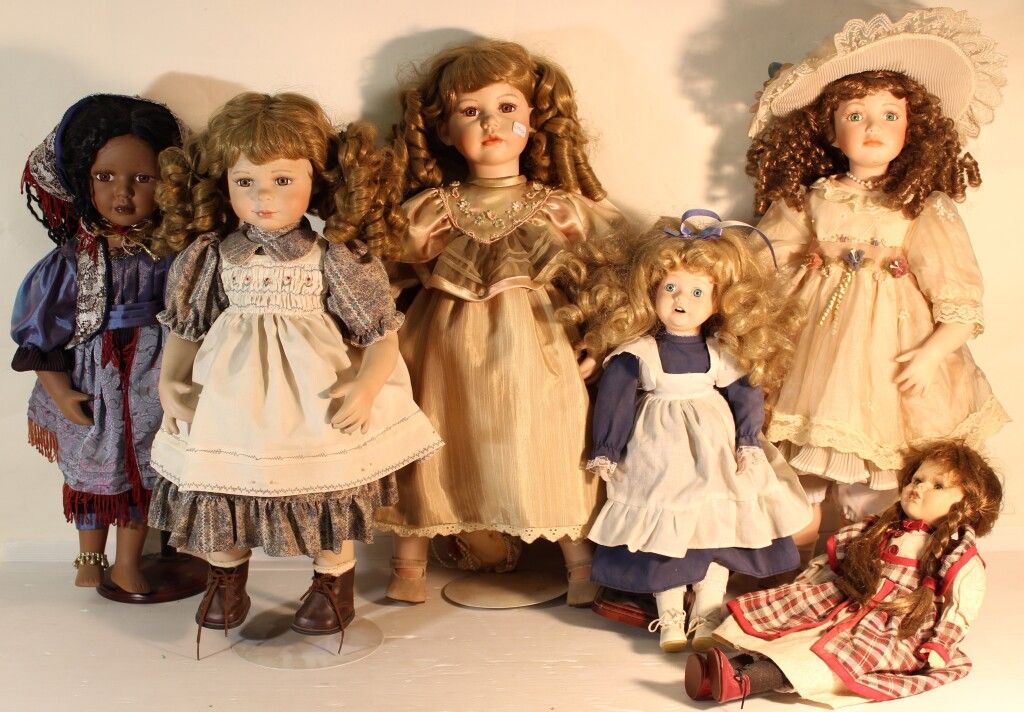 Null Set of 6 porcelain head dolls.