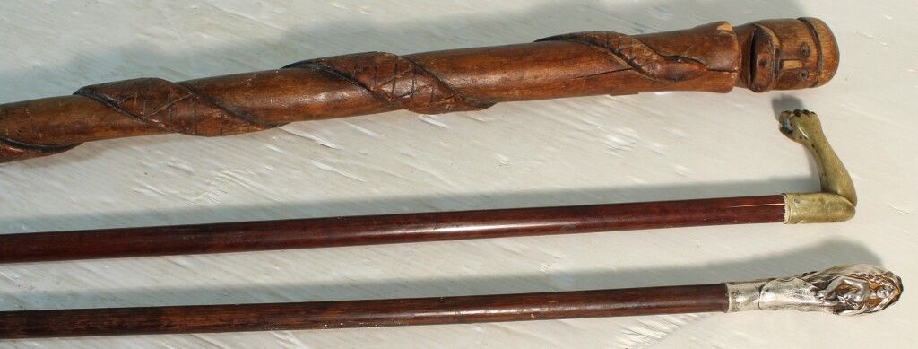 Null Set of 3 canes, one of which is in silver signed Robardey.