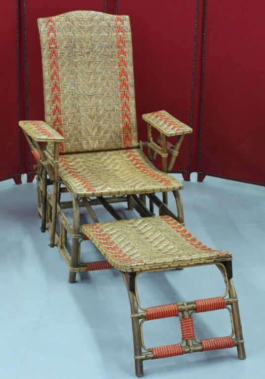 Null Loungesessel aus Bambus mit orangefarbenem Geflecht.