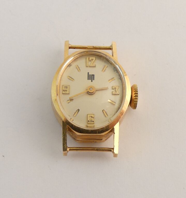 Null LIP. Montre de dame en or jaune. Sans bracelet. PB. 6.7g.