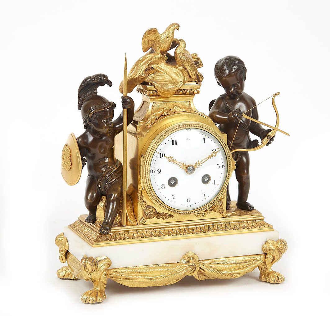 Null Clock love triumphant of the war. Gilded and patinated bronze, white marble&hellip;