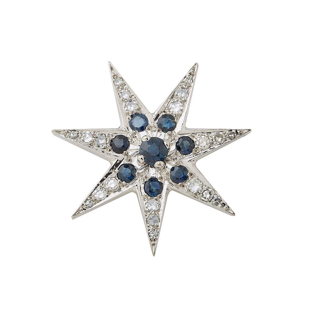 Null 18K(750/°)白金胸针，以完全镶嵌钻石的星星为特色，并辅以圆形蓝宝石。直径：33毫米 毛重：7.4克