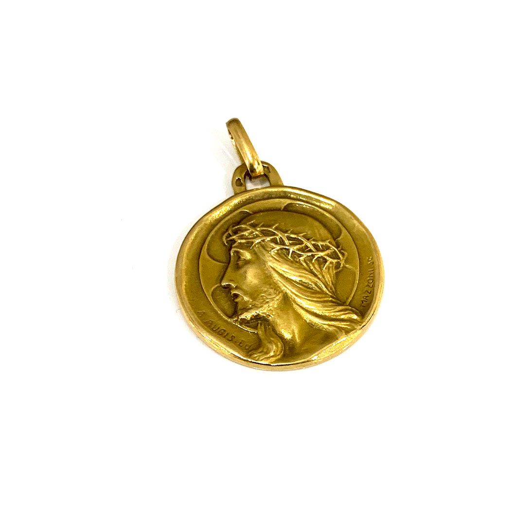 Null Medalla religiosa en oro amarillo de 18 quilates (750/°). Peso bruto : 9,3g