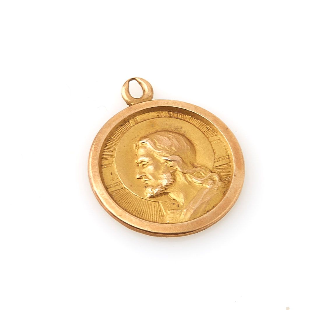 Null Medaglia religiosa in oro giallo 18 carati (750/°°). Peso lordo: 2,8 g