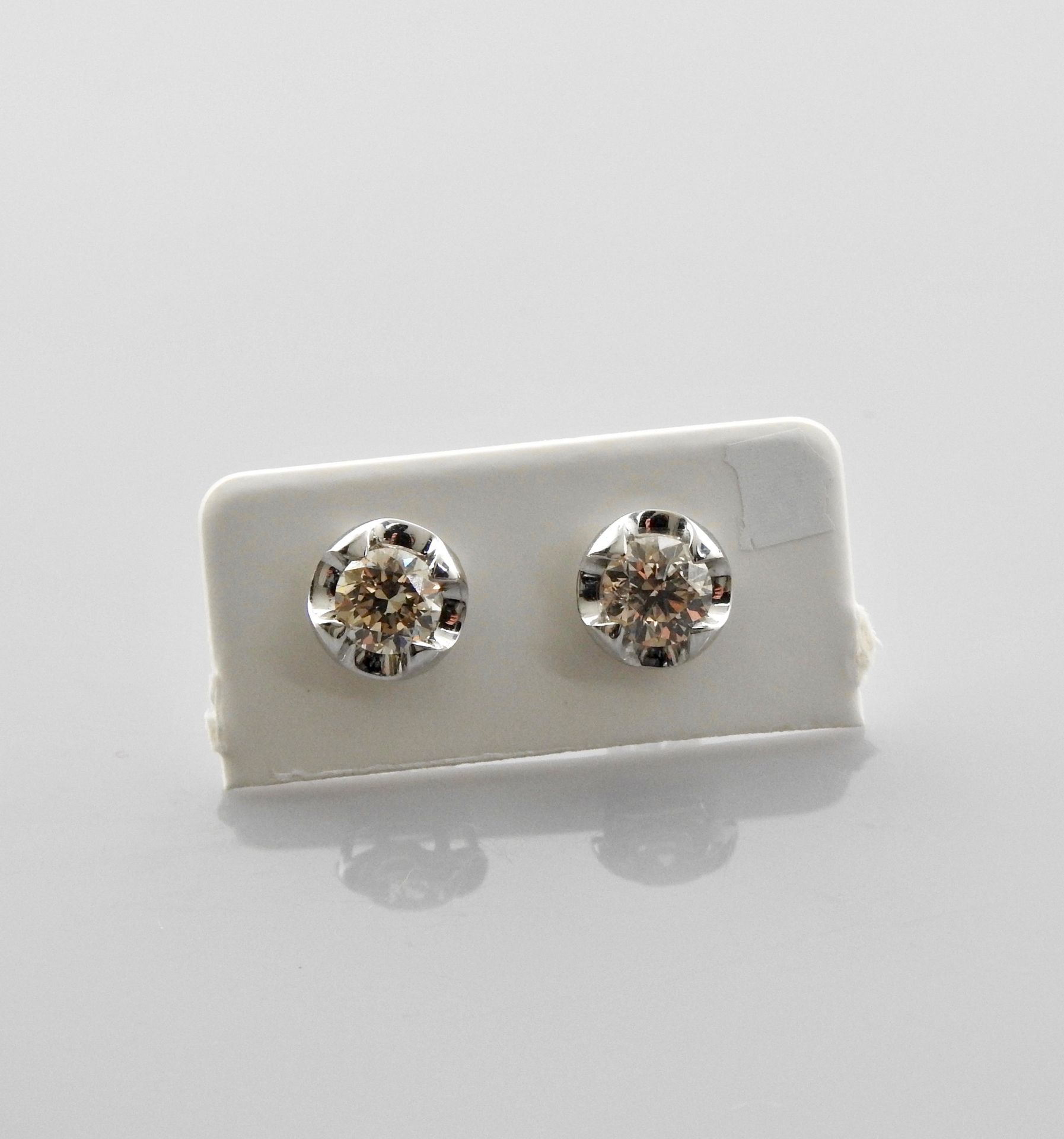 Null Earrings in white gold, 750 MM, each set with a brilliant, total 1.10 carat&hellip;