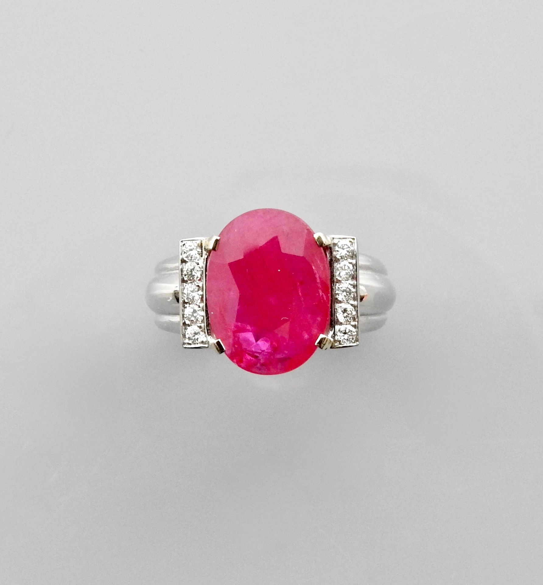 Null Ring in white gold, 750 MM, centered on an oval ruby weighing 4.50 carats b&hellip;