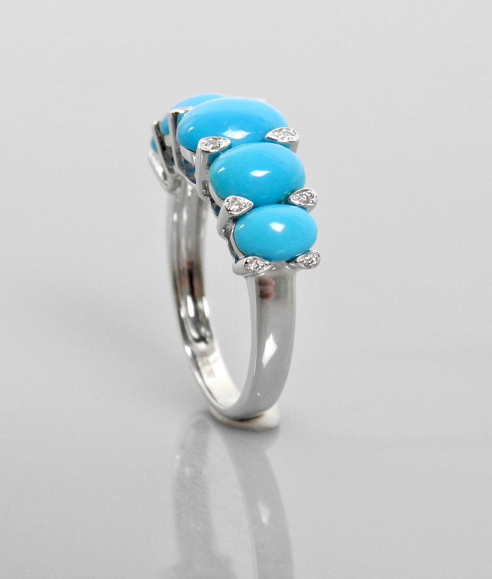 Null Ring ' Garter ' in white gold, 750 MM, underlined by turquoises, total 2,50&hellip;