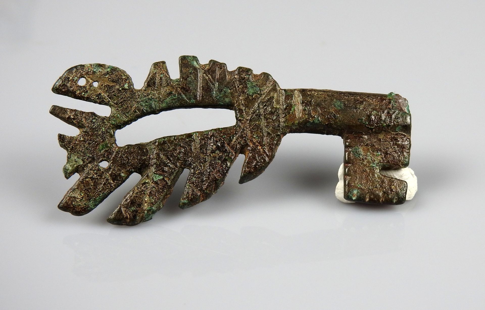 Null 好奇的旋转钥匙与工作的手柄

前19世纪某省著名人士的收藏

青铜6.3厘米

罗马时期或后期