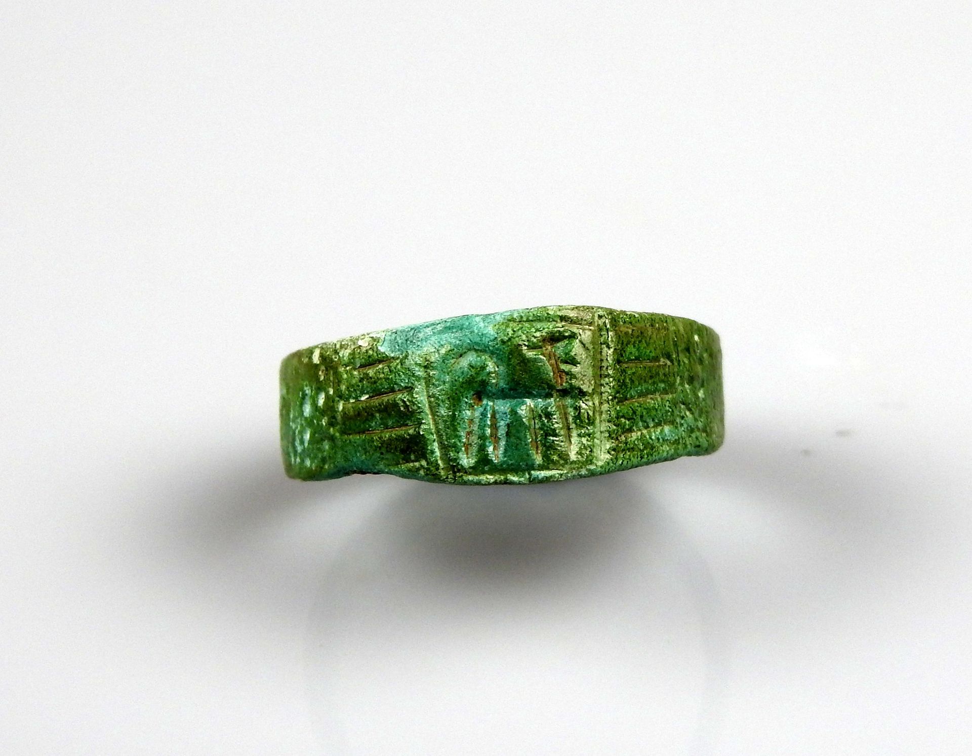 Null Ring decorated with a stylized animal, probably a horse

Bronze Finger size&hellip;