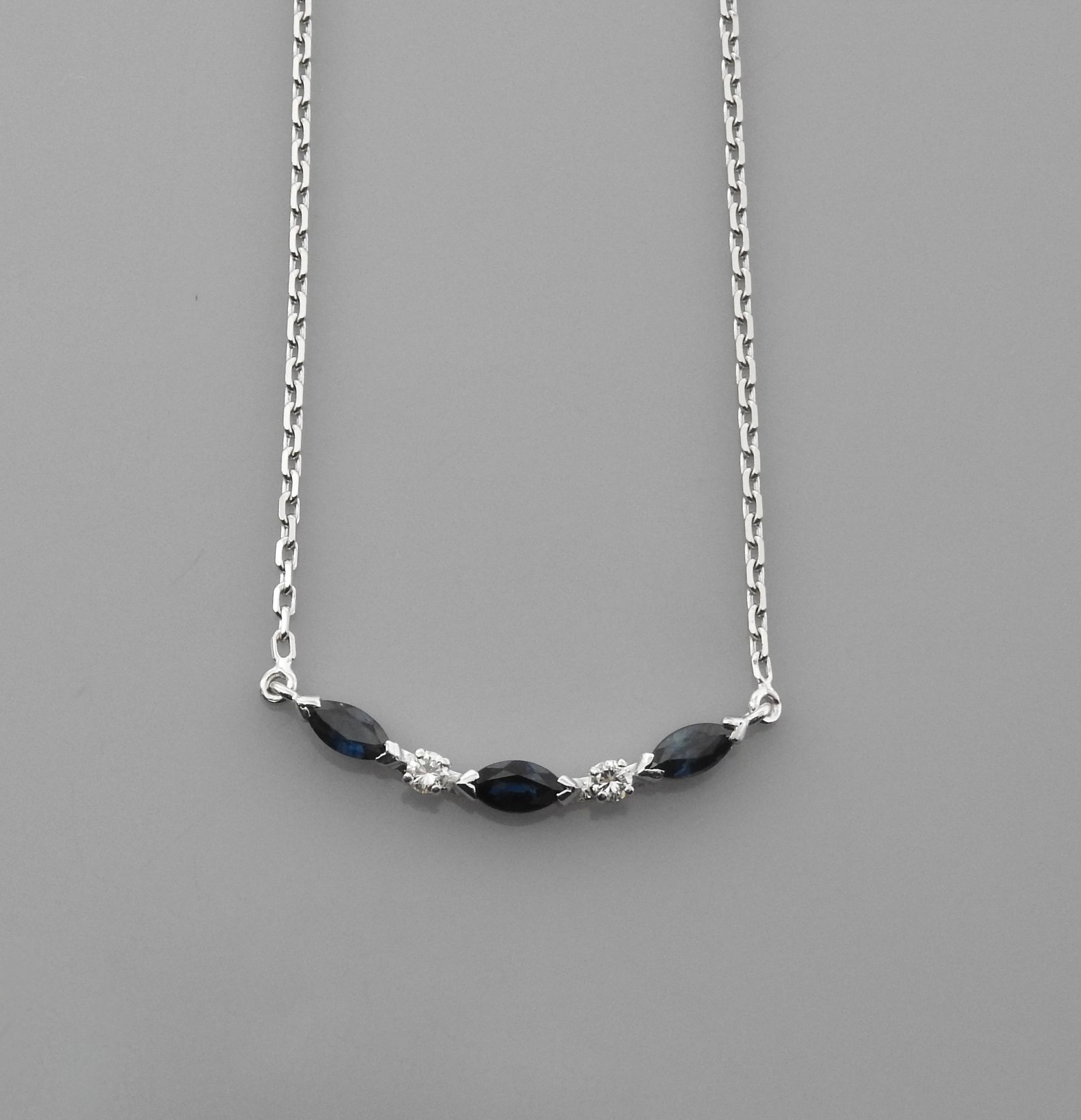 Null Necklace in white gold, 750 MM, centered with navette-cut sapphires and dia&hellip;