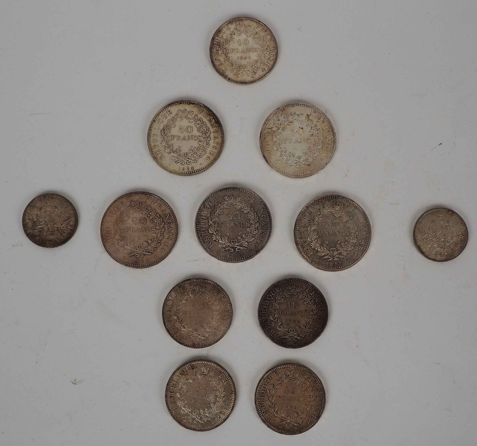 Null Lot de pièces en argent : 5 de 50 fr, 5 de 10 fr et 2 de 5 fr. 

Poids brut&hellip;