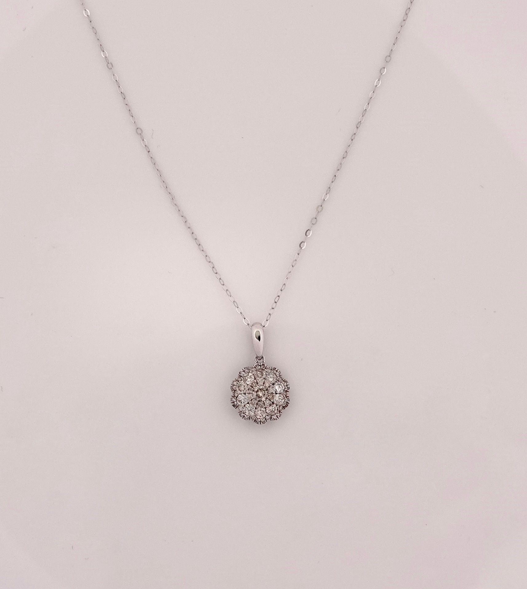 Null Necklace in white gold, 750 MM, centered on a rosette covered with diamonds&hellip;