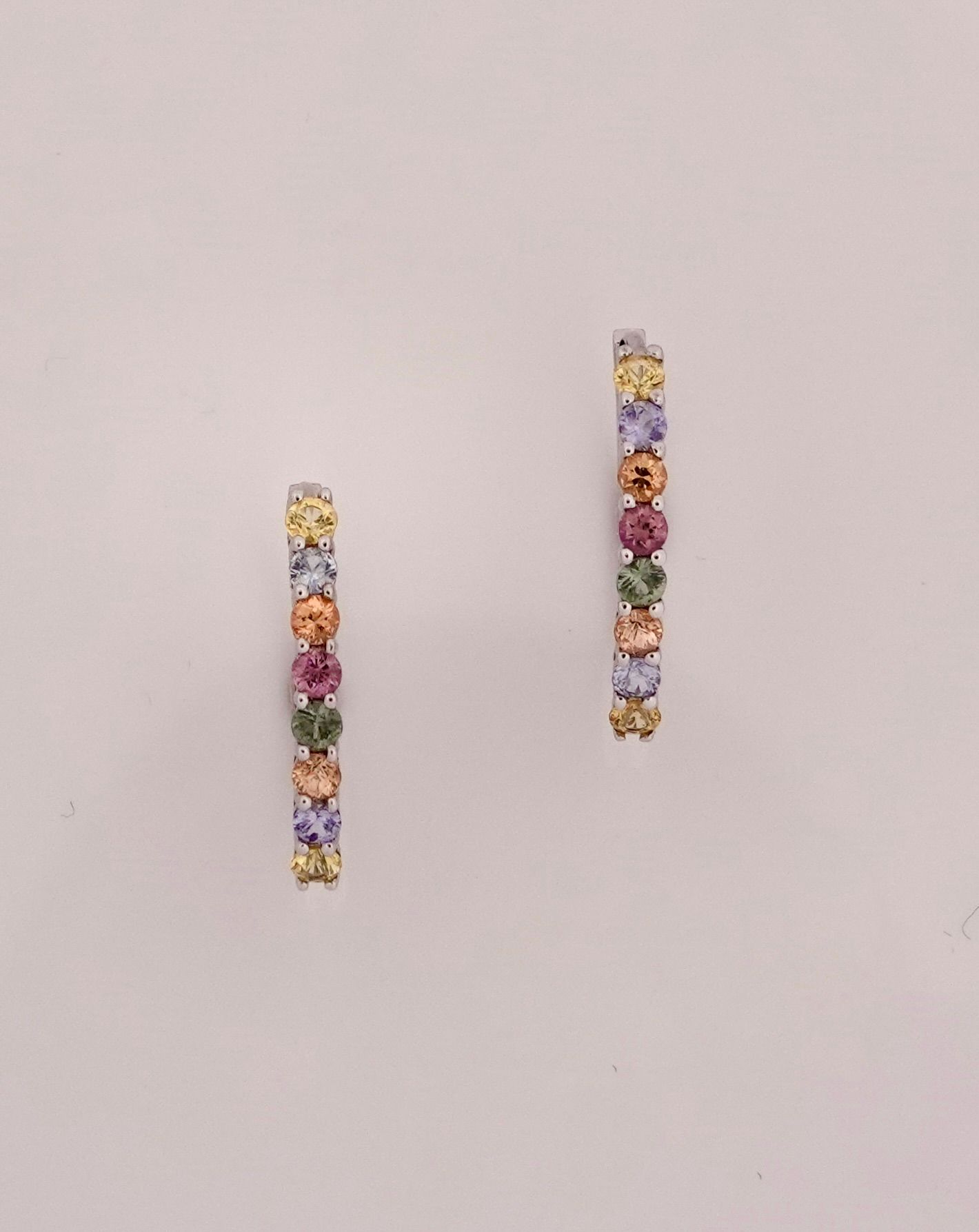 Null Fine creoles in white gold, 750 MM, highlighted with multicolored sapphires&hellip;