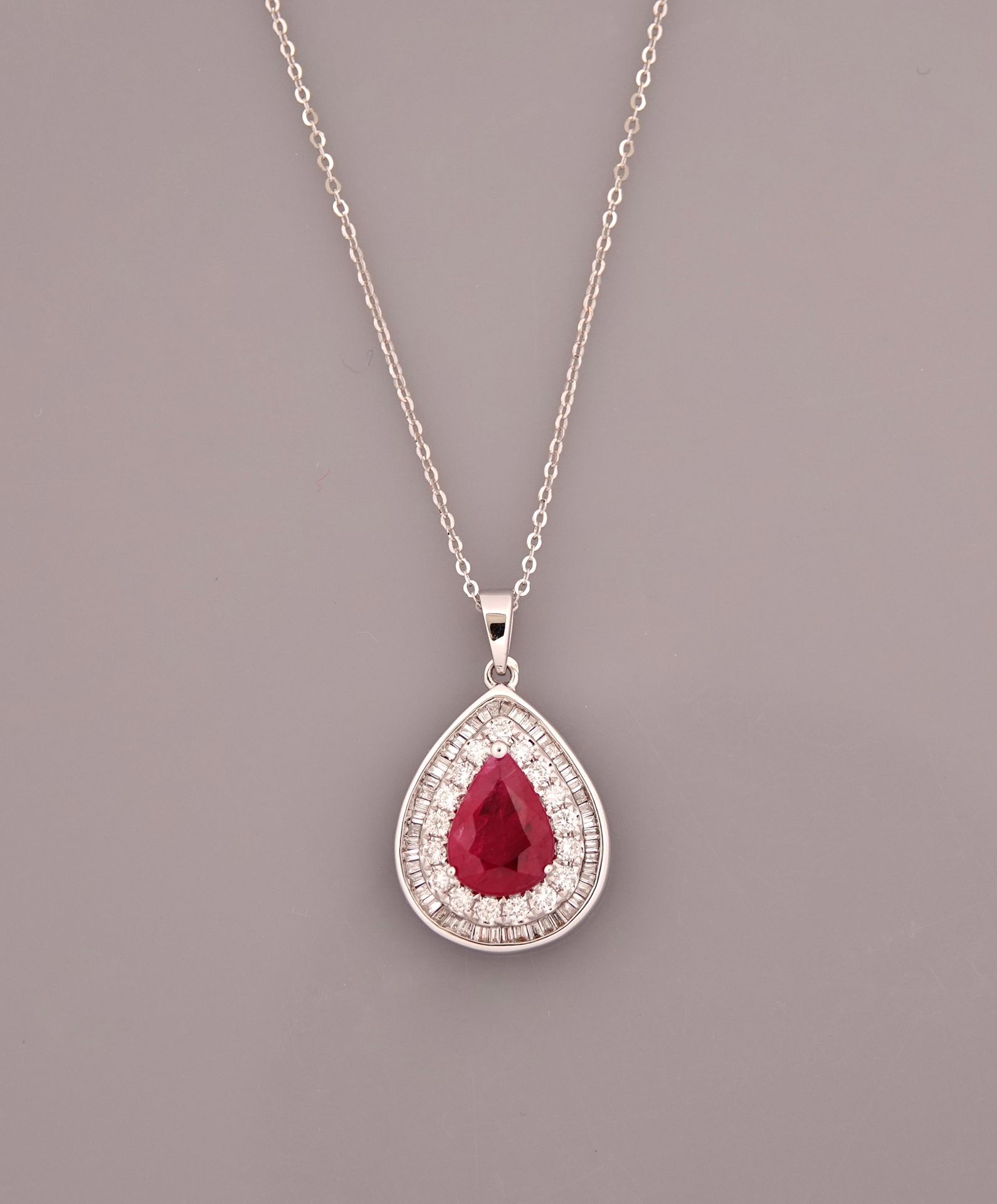 Null Chain and pendant in white gold, 750 MM, adorned with a pear-cut ruby weigh&hellip;