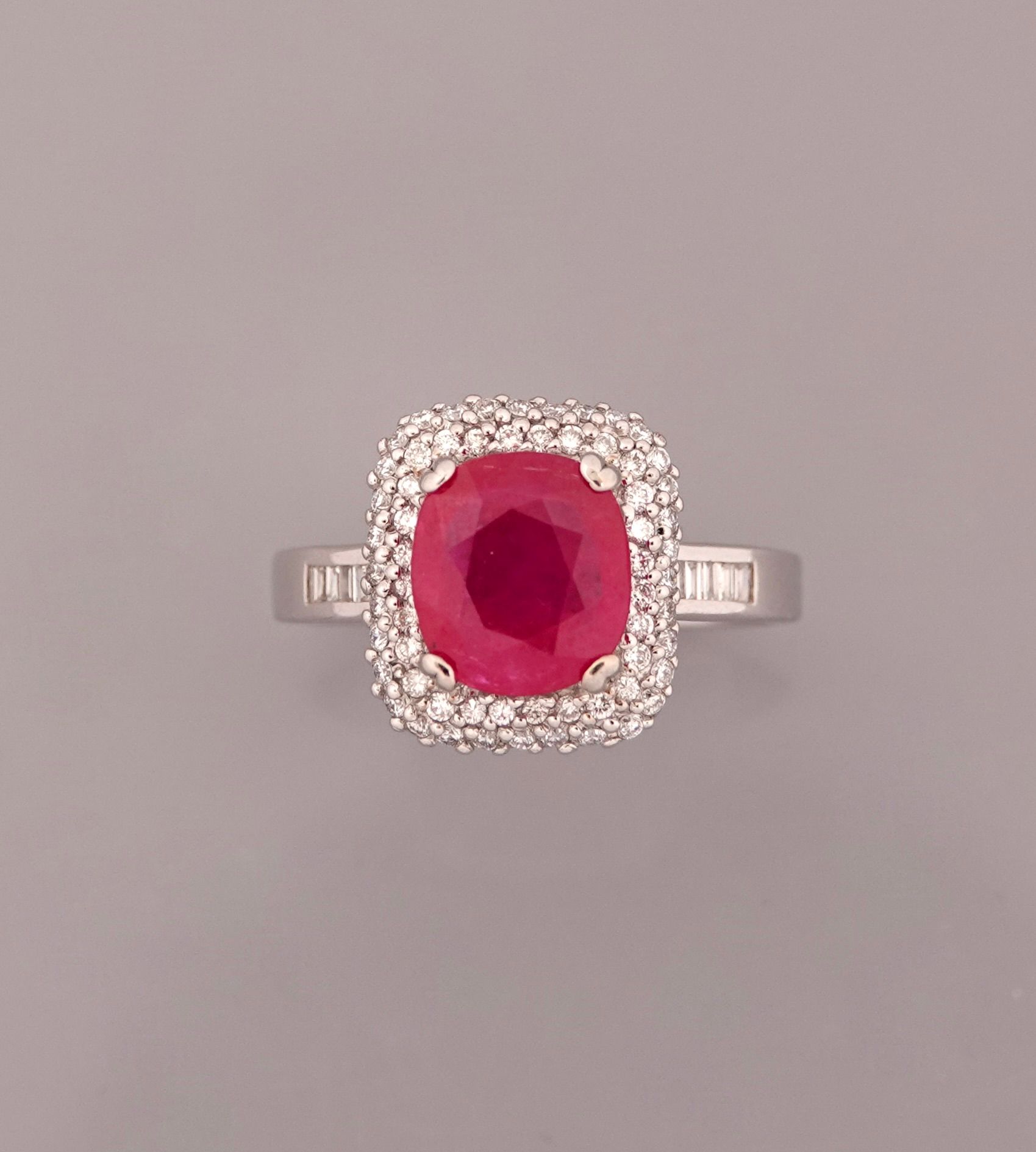 Null Ring in white gold, 750 MM, set with an oval ruby weighing 2.37 carats surr&hellip;