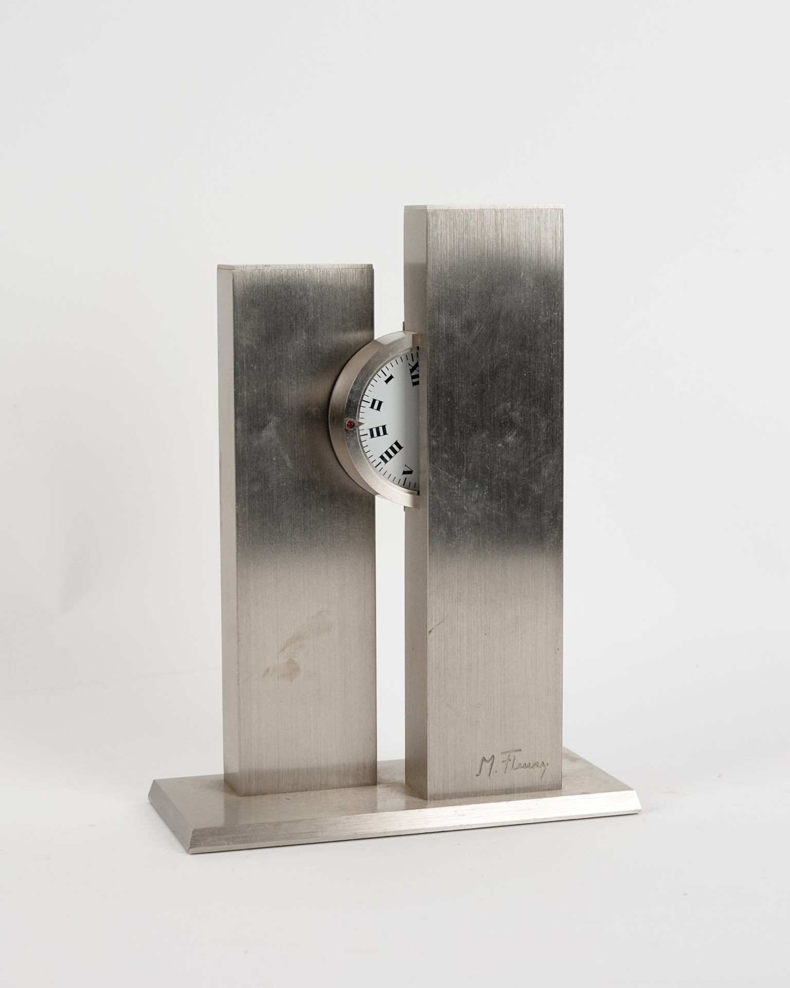 Null Michel FLEURY (XX° siècle)

Pendule de table asymétrique en acier brossé

M&hellip;
