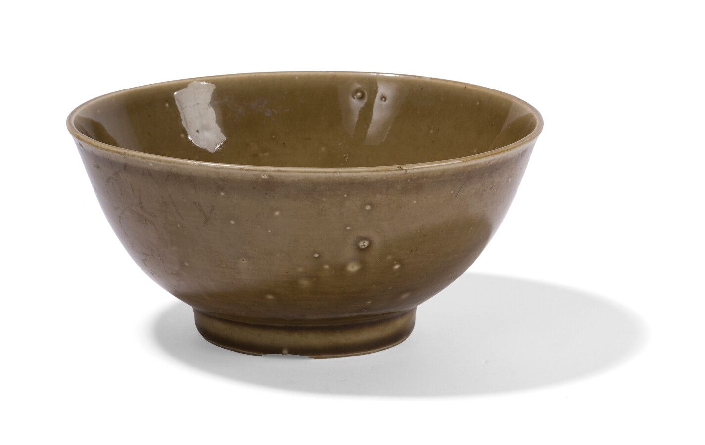 Null 绿色釉面瓷碗

中国，19世纪

高：8厘米，长：20厘米

(底座上的一个缺口)