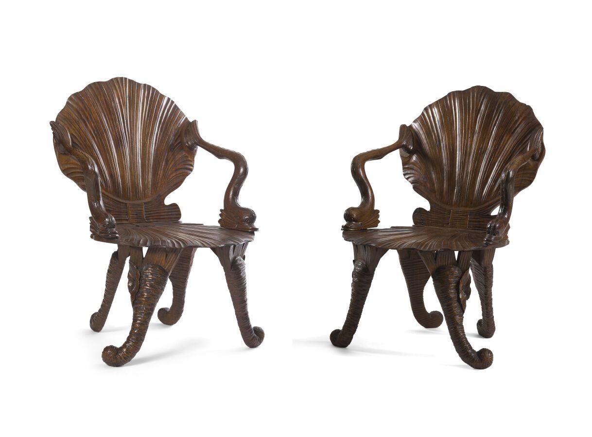 Null 
PAIR OF CAVE ARMCHAIRS IN CARVED WALNUT




the armrests with dolphin head&hellip;
