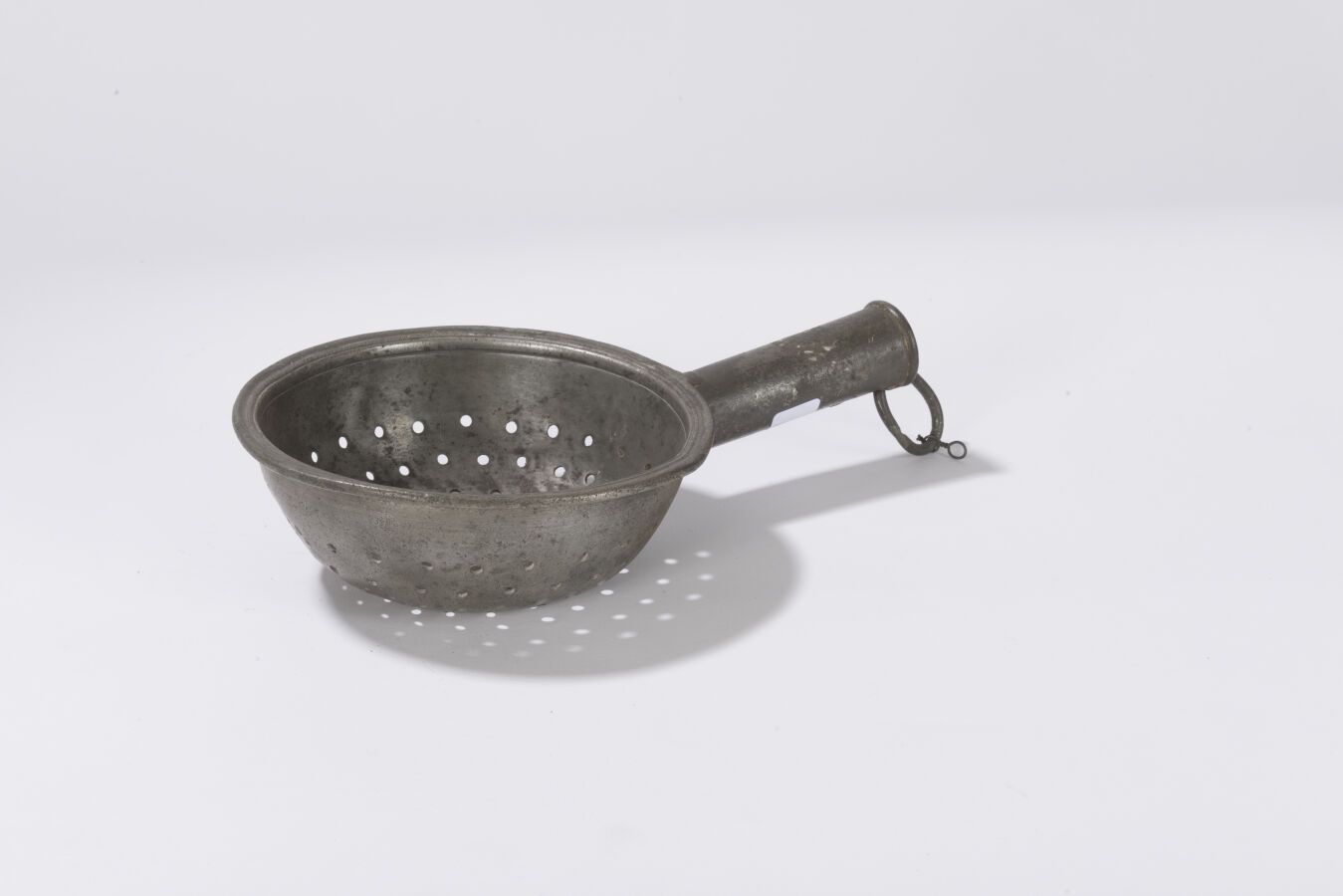 Null Rare colander with handle, late 18th century. RR.