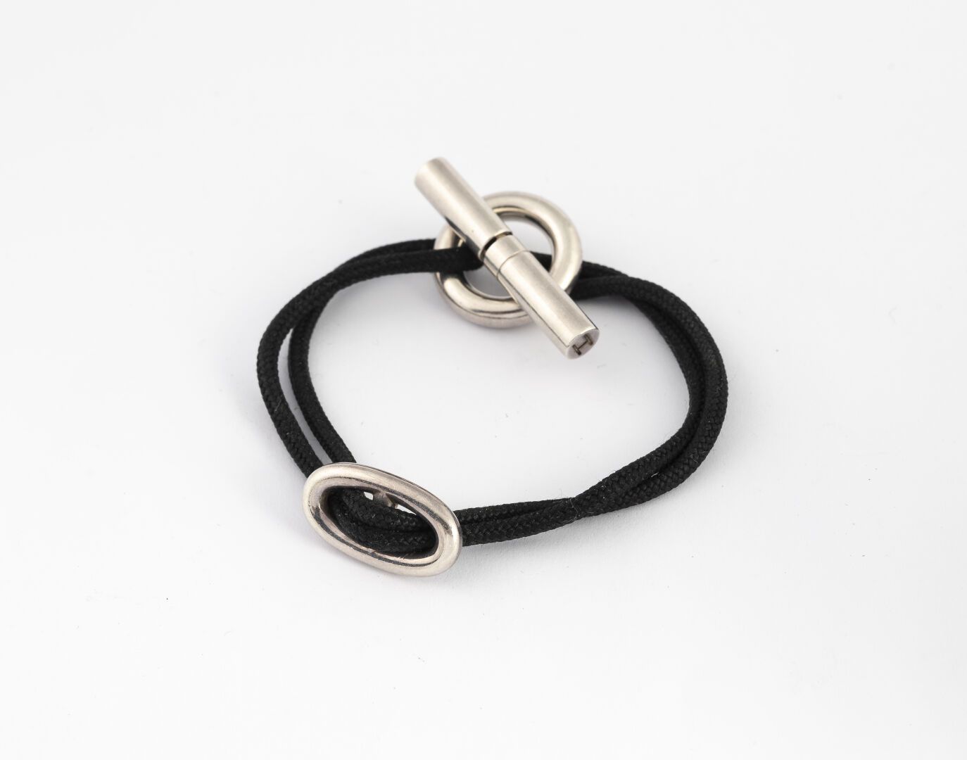 Null HERMÈS PARIS

Cord bracelet model "Chaîne d'Ancre

In silver 925°/°°

Signe&hellip;