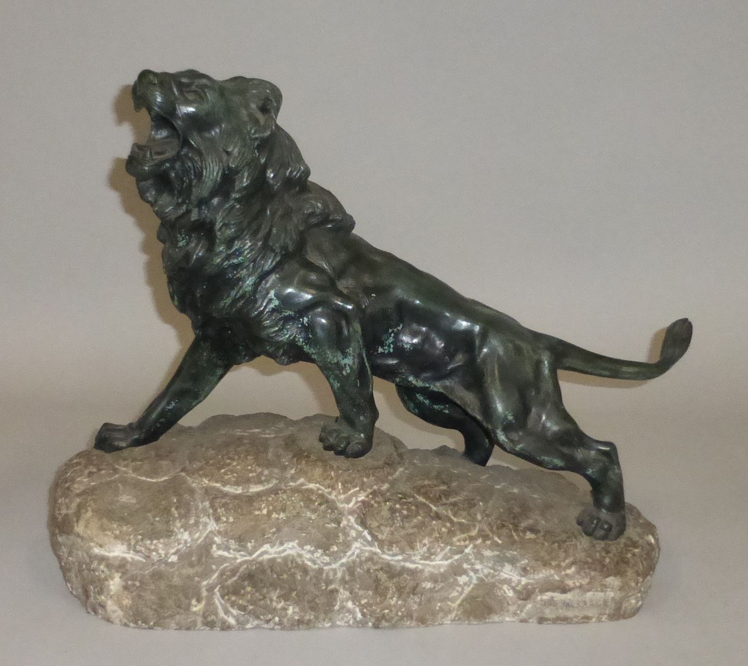 Null René ANDREI (1906-1987)

"Lion rugissant"

Sculpture en bronze patiné sur u&hellip;