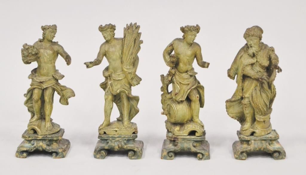 Null Quatre sculptures en peuplier peint façon bronze représentant les quatre sa&hellip;
