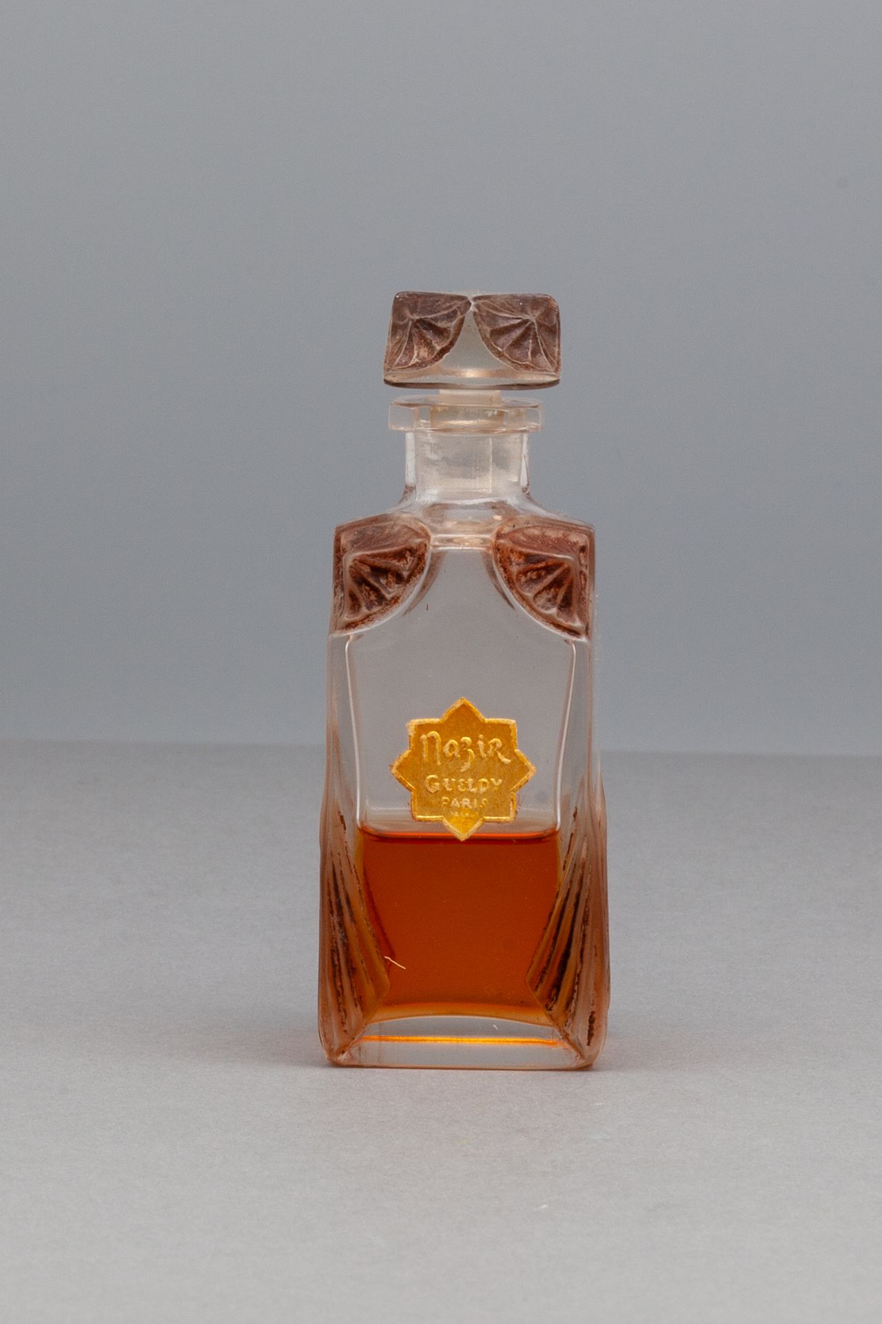 GUELDY "NAZIR" Glass bottle decorated with stylized patterns of sepia color. Tit&hellip;