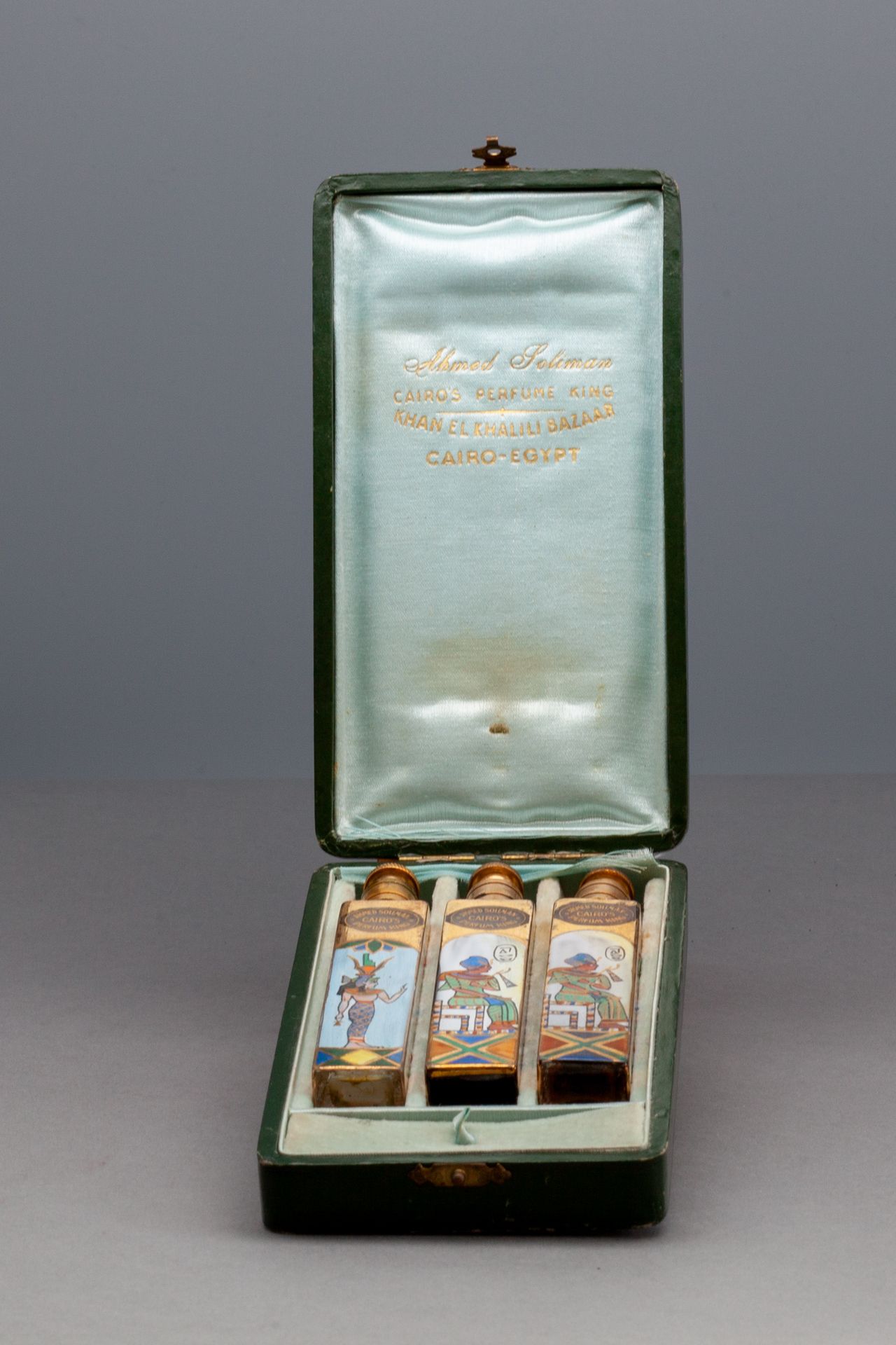 Ahmed SOLIMAN "CAIRO'S PERFUME KING" Box containing three bottles with polychrom&hellip;