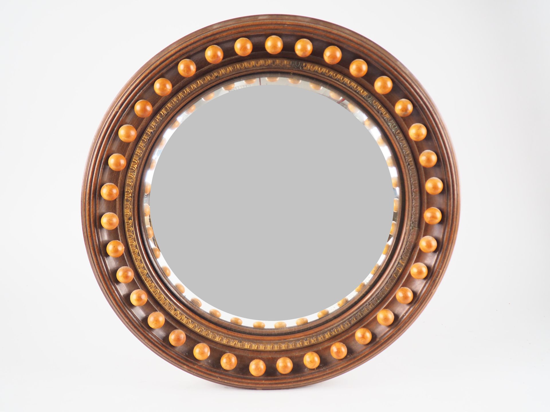 Null Mirror called "witch" 1900, mahogany frame decorated with a frieze of beads&hellip;