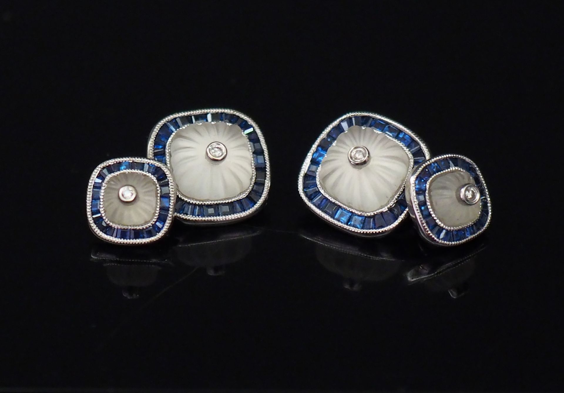 Null Pair of white gold cufflinks, set with gadrooned glass surrounded by a crow&hellip;
