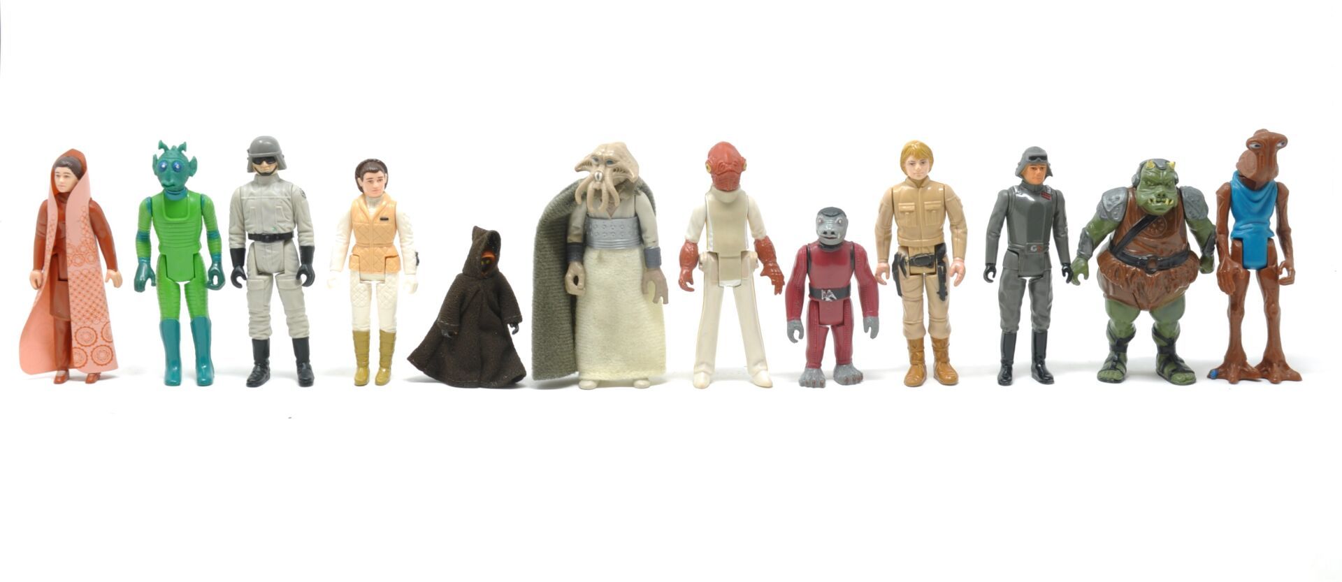 Null STAR WARS

Kenner, Set mit 12 unbewaffneten Figuren, darunter Jawa Stoffumh&hellip;