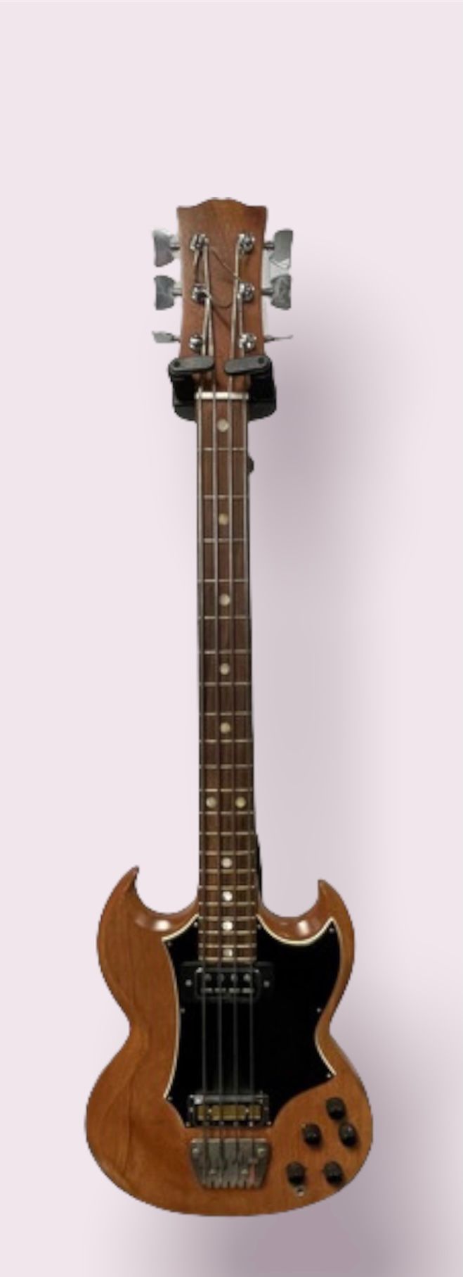 Null 电子低音吉他，SG型

经清漆处理的木材

(背面可见孔)

带灰色箱子（锁和铰链生锈了）