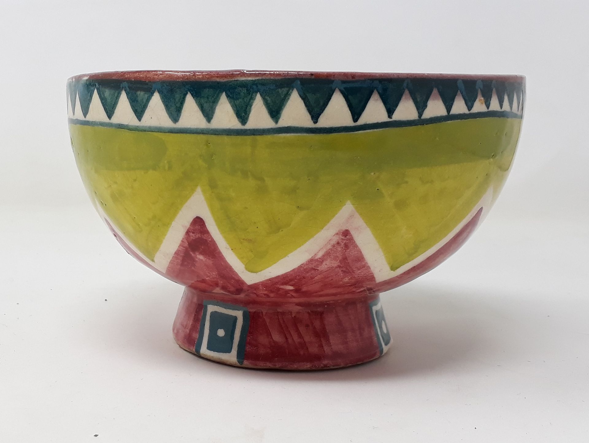 Null TREE WITH GOATS

Earthenware bowl decorated with green and red zigzags, sig&hellip;