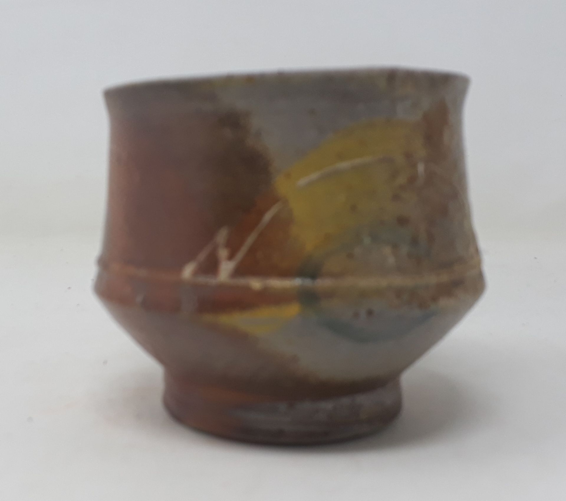 Null DAIGELER Suzanne

棕色装饰的石器壶，壶身中空，壶跟下有n°167的字样。

直径：8.5；高：8厘米