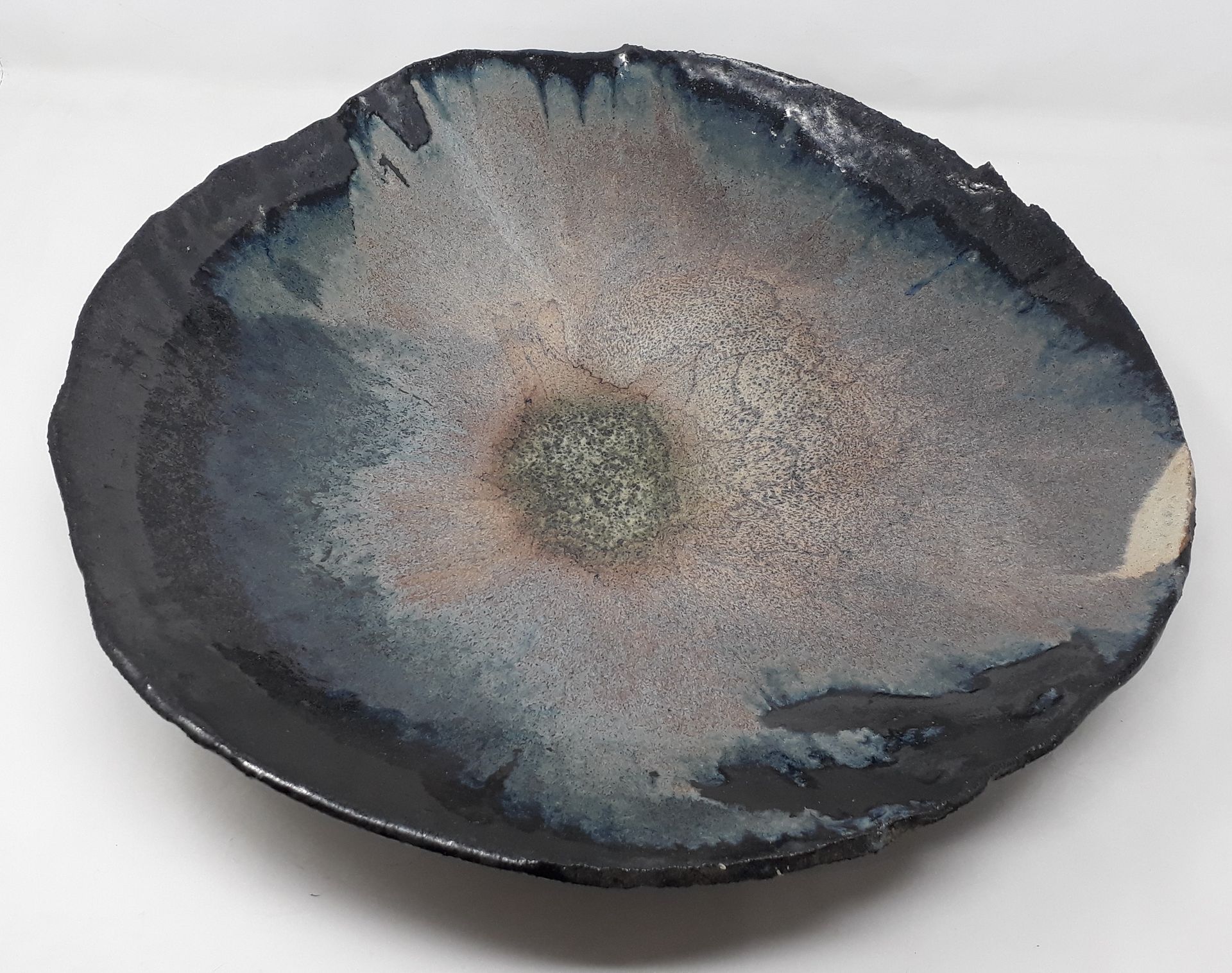 Null School Xth century

Stoneware bowl with black, blue and pinkish beige glaze&hellip;