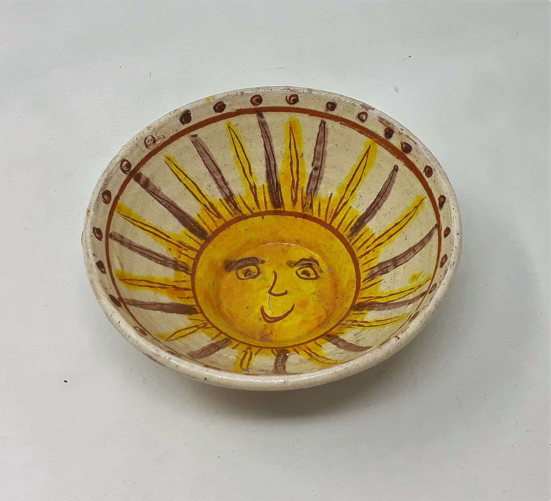 COLIBABA (Romanian folk art) 
Earthenware bowl decorated with sun and fish, sign&hellip;