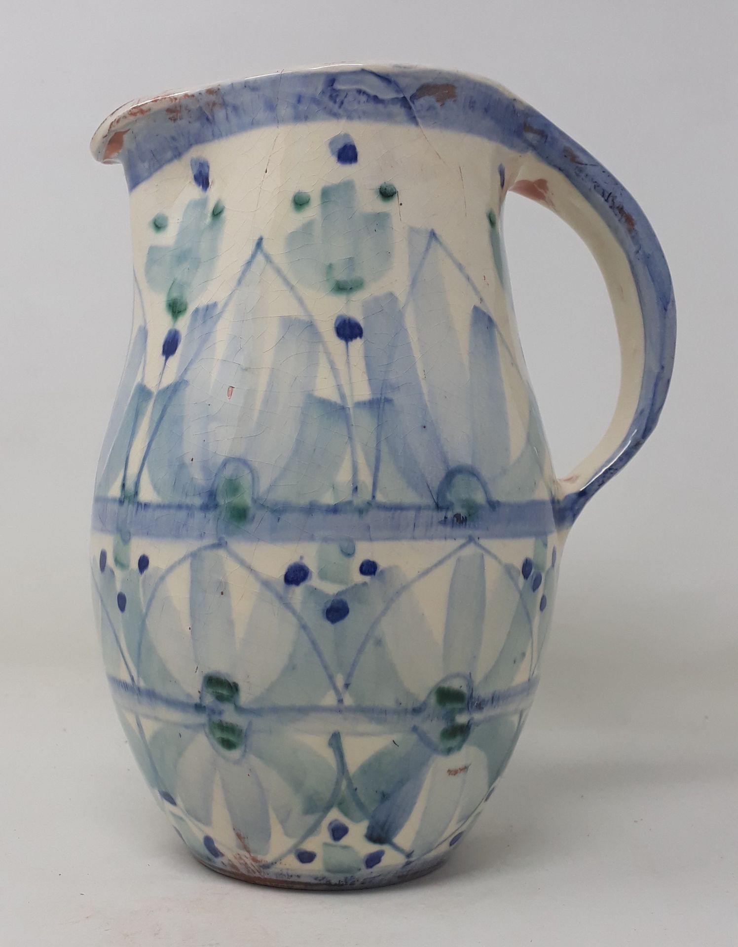 Null DEJARDIN Alain

Earthenware pitcher with vegetal decoration on a white back&hellip;