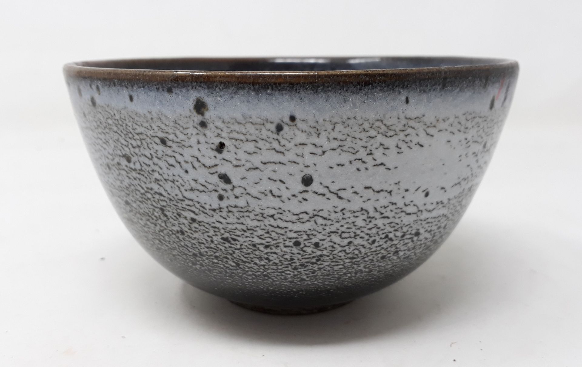 Null FAURE Jean-Claude

Stoneware bowl with blue and black glaze, signed in holl&hellip;