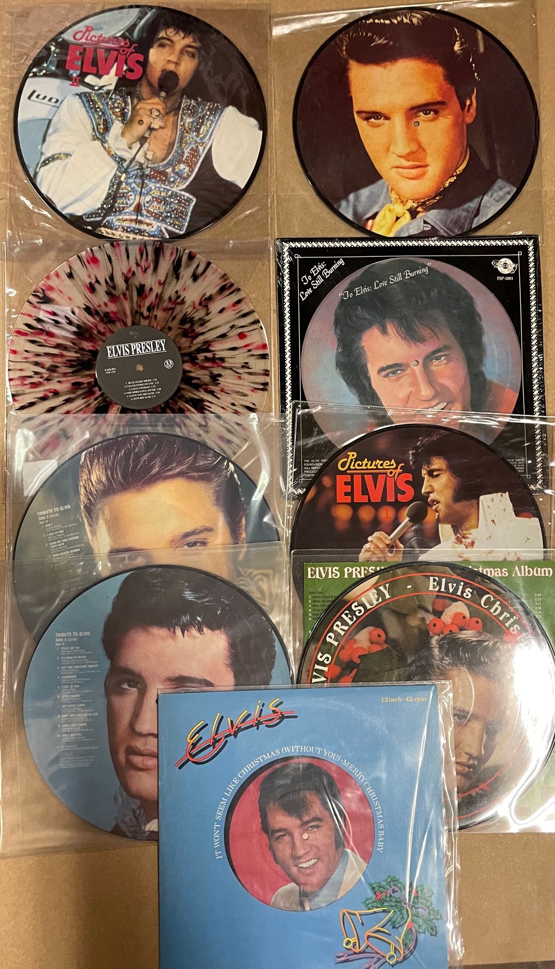 Null Disco de nueve imágenes 33 T - Elvis Presley

EX a NM; EX a NM