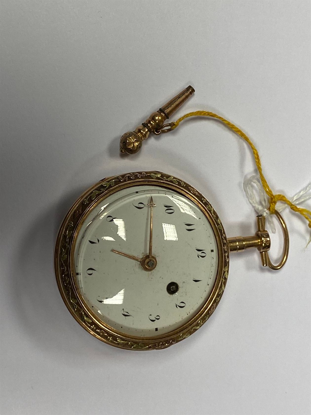 Null A three-coloured gold GOUSSET WATCH, the enamelled dial encircled by a frie&hellip;