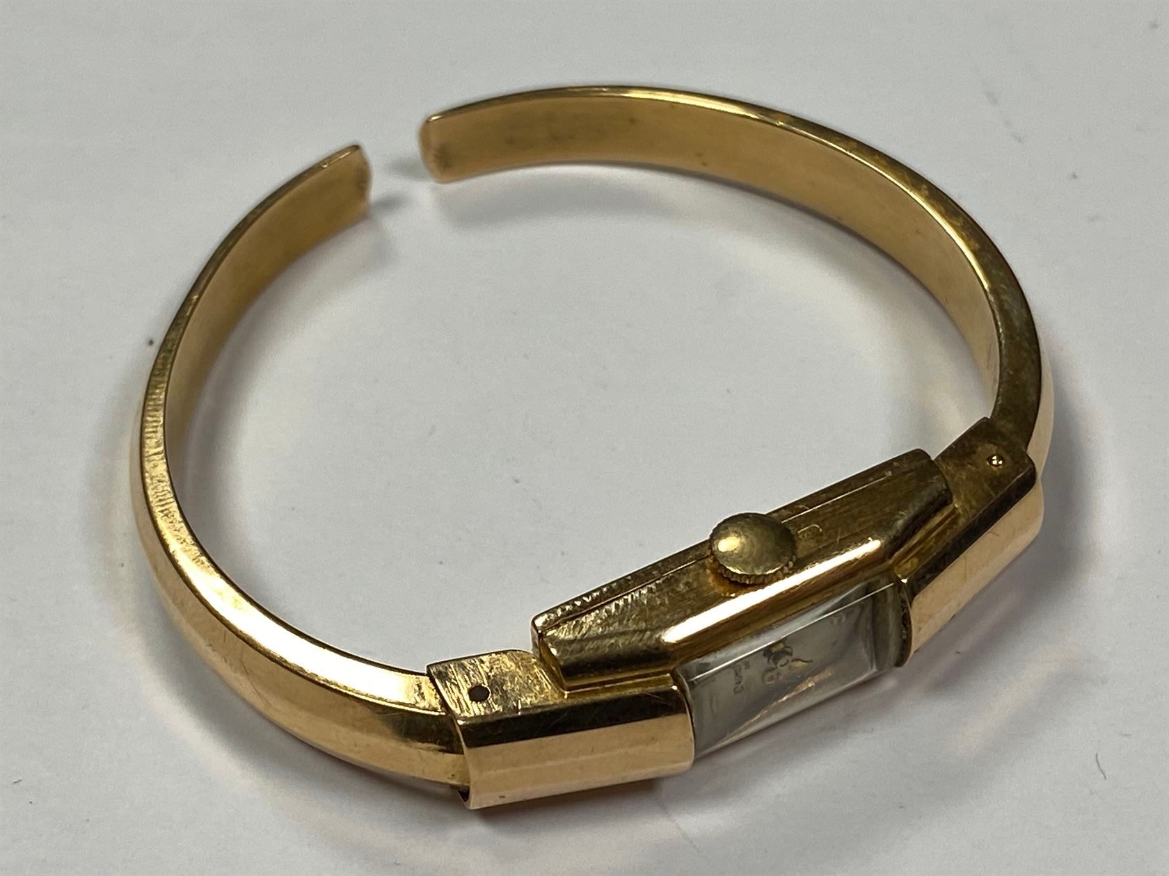 Null BAUM & MERCIER : MONTRE bracelet jonc de femme en or 18 K. PB. 13,59 g.