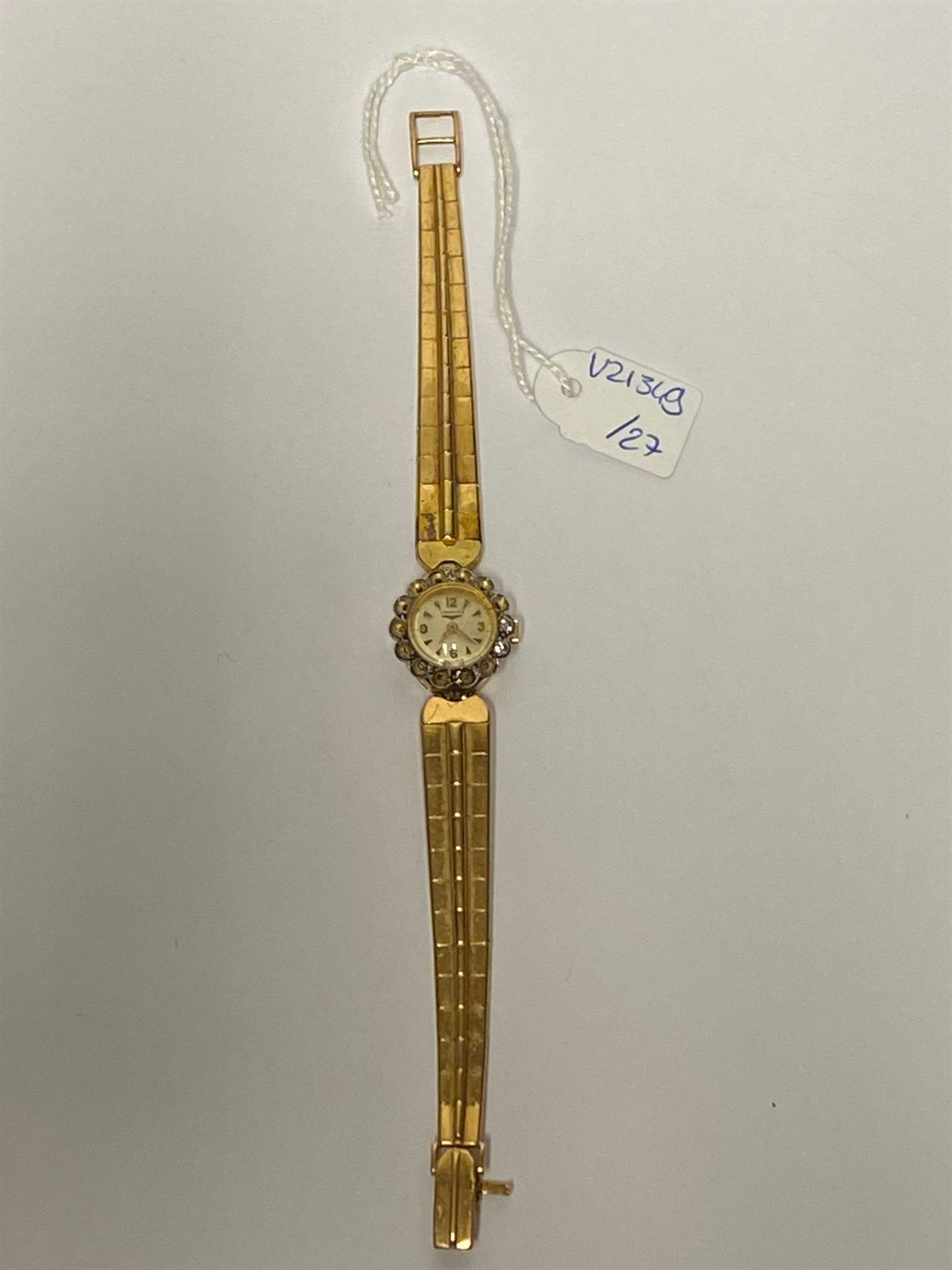 Null LONGINES - BRACELET MONTRE en or jaune 18K (750 Millièmes). Cadran blanc, c&hellip;